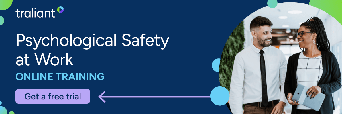 Banner ad from Traliant promoting “Psychological Safety at Work” online training. Features a smiling man and woman walking together in a hallway, with a button that says “Get a free trial” and bold text emphasizing the course topic.